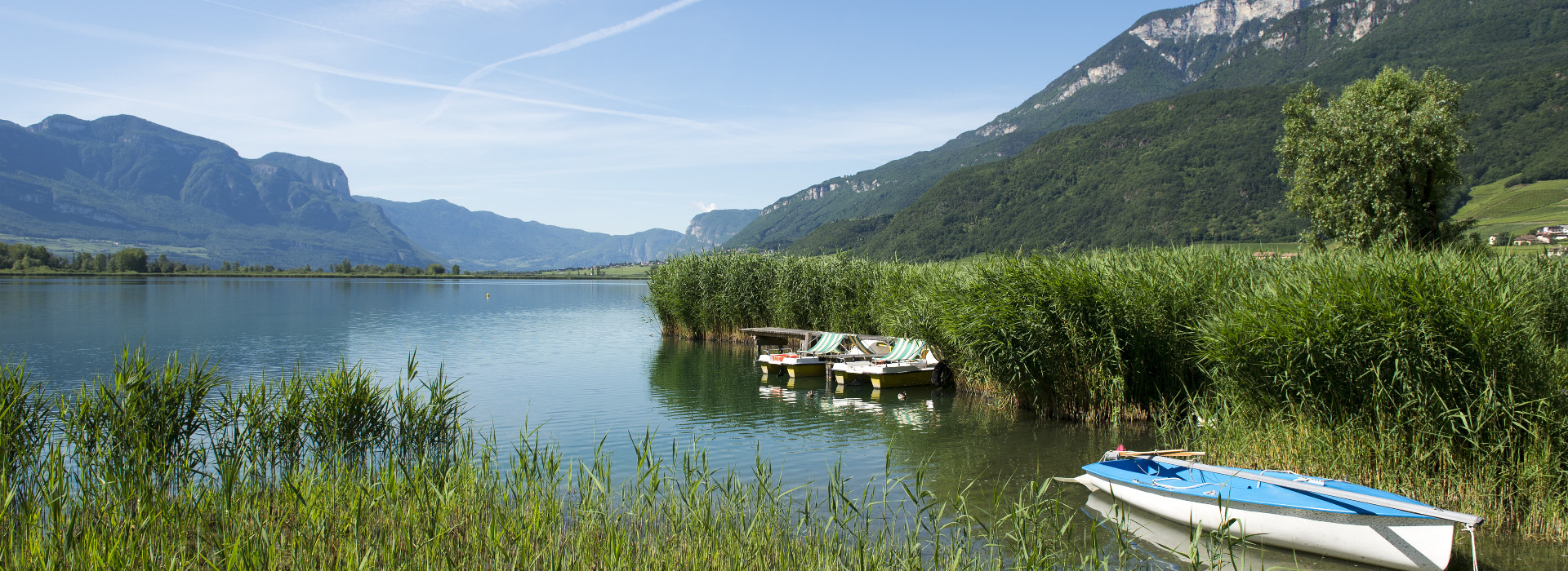 Boote am Kalterer See: Urlaub im Hotel Kaltern